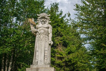 The statue of Radegast, a Slavic god of fertility, near the summit of Radhost mountain in the Beskids in Czechia