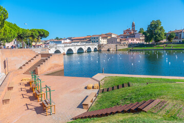 Sundeck overlooking Bridge of Tiberius (Ponte di Tiberio) in Rimini, Italy.