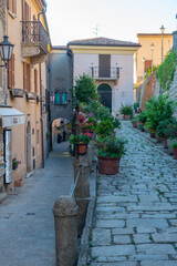 Sunset view of a street in the old town of Citta di San Marino © dudlajzov