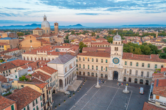 Sunrise view of Torre dell'Orologio and Cathedral of Santa Maria Assunta in Italian town Padua