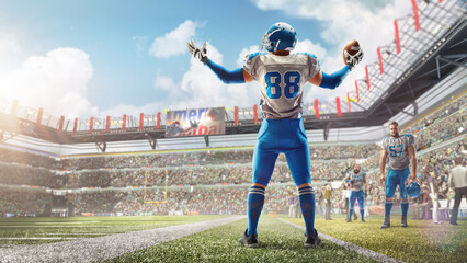 Joy in football. American football player celebrating victory at stadium during daytime. Sport...