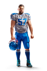 Sport. An American football player stands and holds a helmet in his hand. Isolated on white...