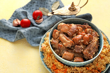 Tasty Asian pilaf on light background