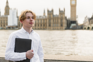 student  in London with laptop