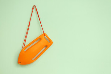 Life board hanging on green wall