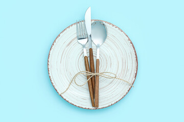 Simple table setting on blue background