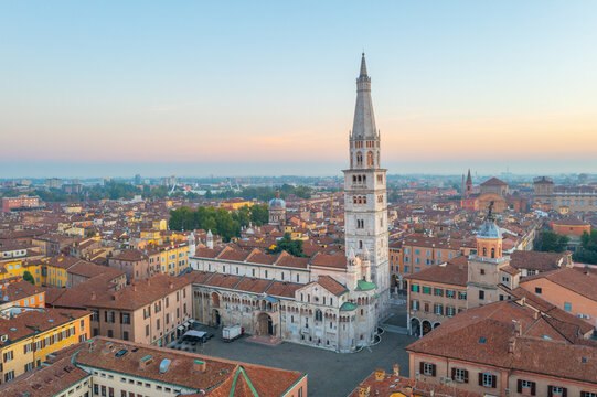 Sunrise view of the Cathedral of Modena and Ghirlandina tower in Italy