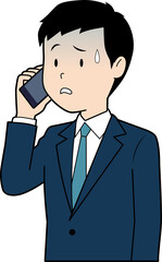 電話で青ざめる男性ビジネスマン