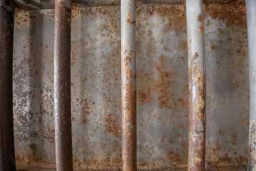 Old walls with iron bars that are rusting