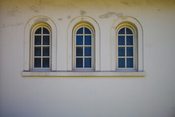  Abandoned Building with Three Arched Windows.