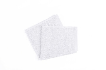 White towel isolated on white background. Top view
