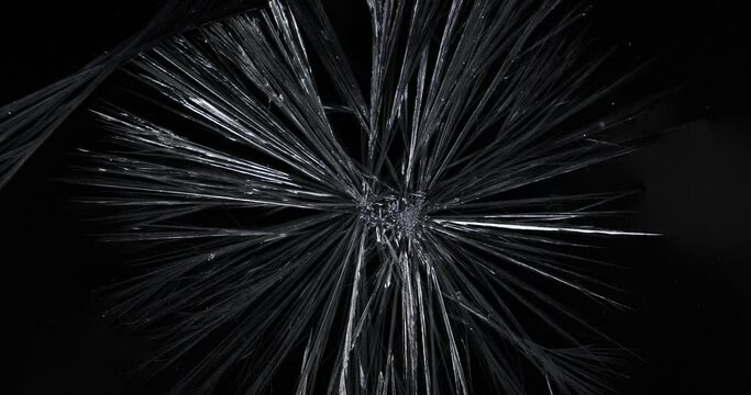The effect of crystallization of ice crystals on a black background.