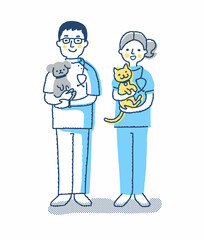 犬と猫を抱っこしている動物病院スタッフ