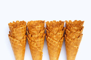 Empty ice cream cone on white background.