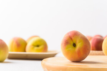 Fresh peach fruit on white background