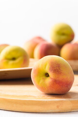 Fresh peach fruit on white background