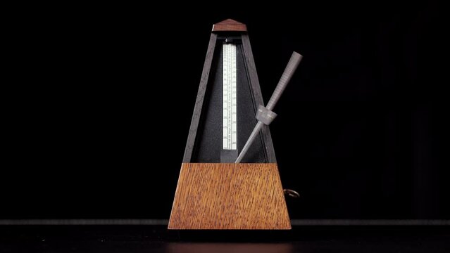 Metronome clicking on a table