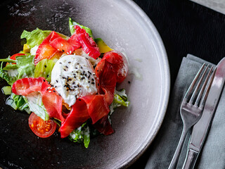 plate of salad on the dining table