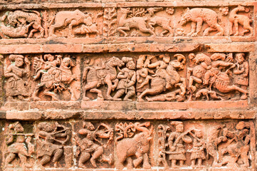Figurines made of terracotta at Radhagobinda Temple, Bishnupur , West Bengal, India .
