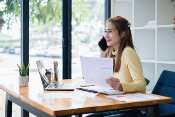 Business woman or accountant or banker audit and analysis with financial costs wisely and carefully, investment and saving concept.