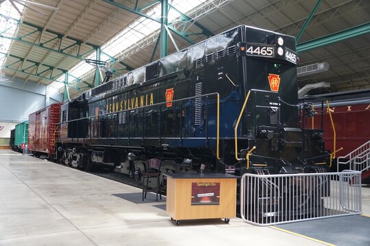 Strasburg, Pennsylvania, U.S.A - March 26, 2022 - The 4465 Pennsylvania Railroad E44 black locomotive train by the terminal inside of the Railroad Museum