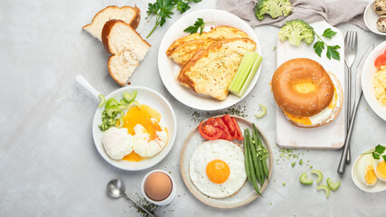 Various ways of cooking chicken eggs on light background.