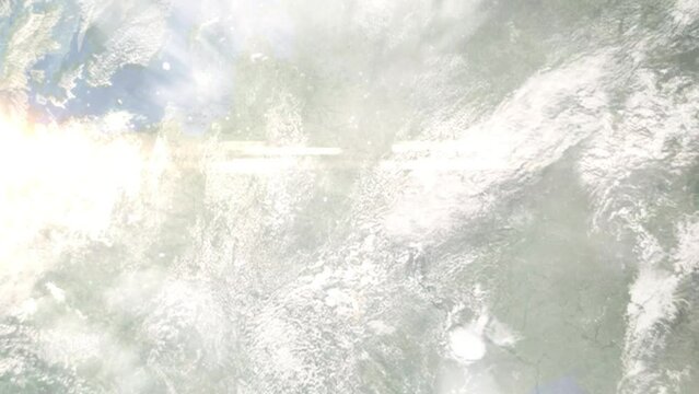 Earth zoom in from outer space to city. Zooming on Soligorsk, Belarus. The animation continues by zoom out through clouds and atmosphere into space. Images from NASA