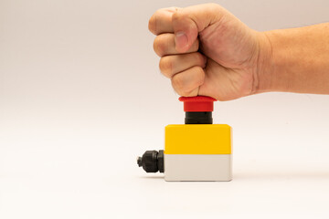 Stop Red Button and the Hand of Worker About to Press it. emergency stop button. Big Red emergency...