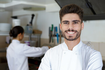 a happy male chef portrait