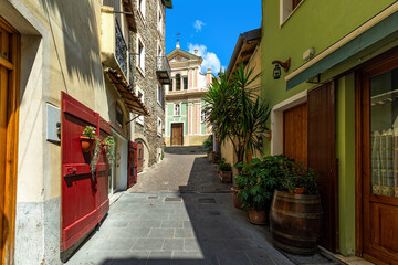 Fototapeta na wymiar Narrow street among small houses in Dolceacqua, Italy.