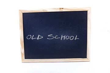The term OLD SCHOOL visually displayed on a chalkboard
