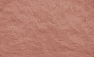 Stucco painted wall background texture, brown color, exterior building facade, Abstract panorama image of Orange clay wall grunge texture background for interior decoration.