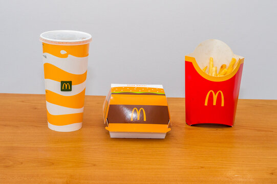Pruszcz Gdanski, Poland - March 31, 2022: McDonald's Big Mac menu with french fries, ketchup and Coca-Cola drink in a McDonald's restaurant.
