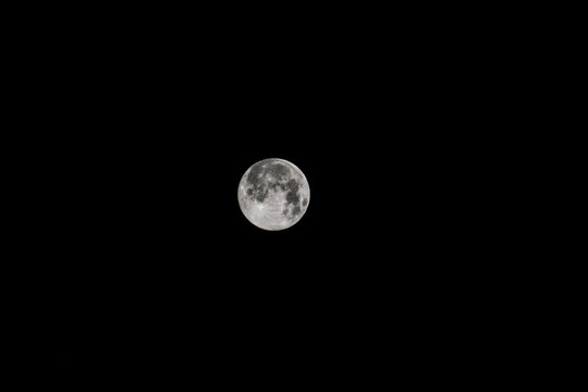 Super full moon with dark background.Mumbai,Maharashtra,India, Horizontal Photography.