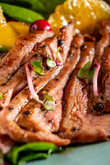 grilled pork with vegetables and sauce