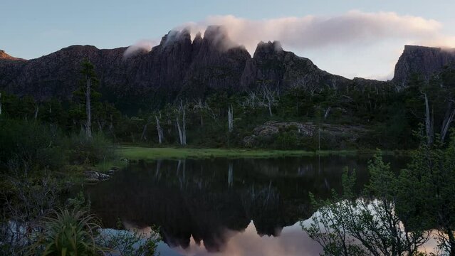 sunrise shot of mt geryon at the pool of memories at the labyrinth in cradle mountain-lake st clair national park of tasmania, australia