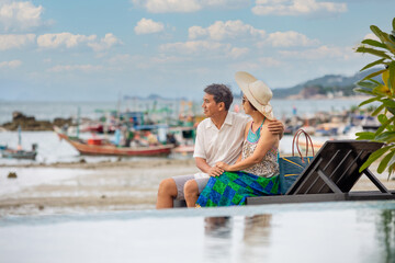 Fototapeta premium Middle aged couple relaxing at lamai beach in koh samui ,Thailand.