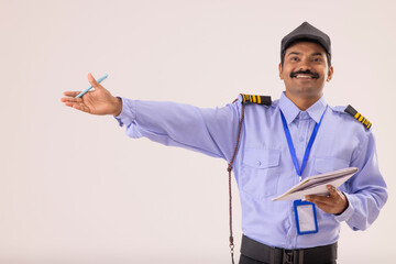 Portrait of security guard pointing away with his hand - Powered by Adobe