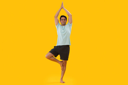 Portrait of a young man practicing yoga