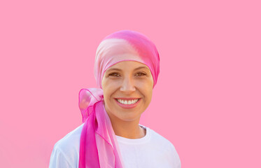 Hopeful woman wearing a headscarf - obrazy, fototapety, plakaty