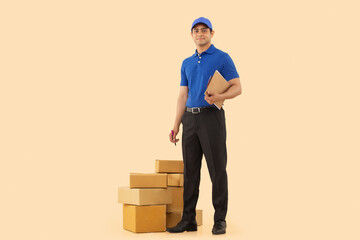 Portrait of a courier delivery boy with holding clipboard and pen in hands