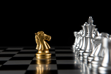 Chess knight on chessboad,competition and strategy concept