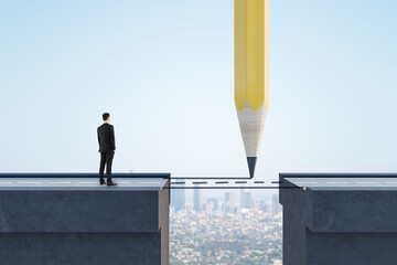 Businessman looking at abstract pencil drawing road gap on bright sky background. Trust and way concept.