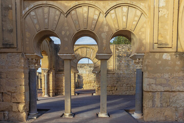 Three arches at the entrance of the Upper Basilical Hall in Medina Azahara, an archaeological site...