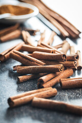 Dry cinnamon sticks on kitchen table. Cinnamon spice.