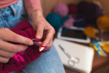 woman is knitting, female hands close-up