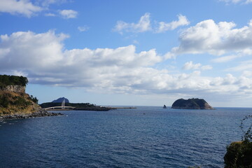 fascinating seascape with island and clouds