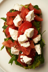 Bruschetta with Tomato, cheese and herbs