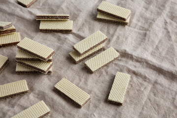 Homemade Wafer Cookies with Hazelnut Cream, side view. Copy space.
