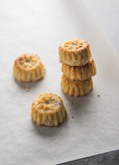 Maamoul - a traditional Mediterranean pastries or cookies placed on a butter paper . Stock image.